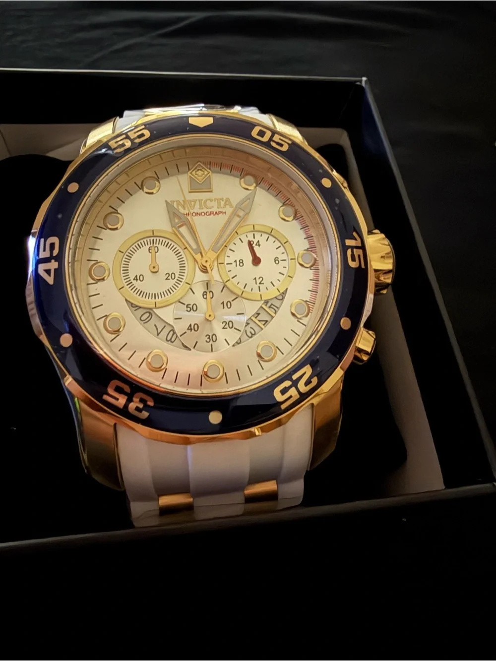 Invicta Gold and White Men's Chronograph Watch with Blue Bezel